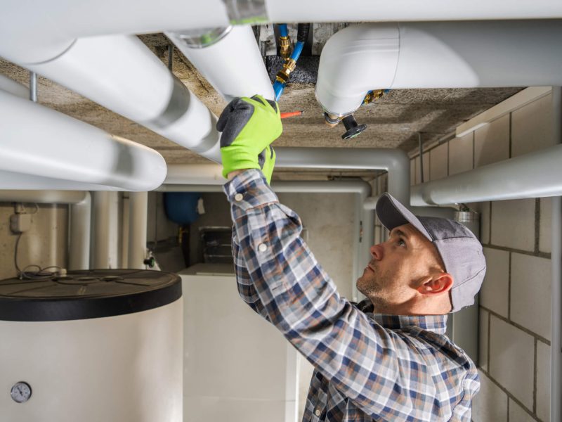 plumbing-contractor-finishing-sanitary-pipeline-installation.jpg